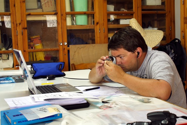 Scott reading pottery